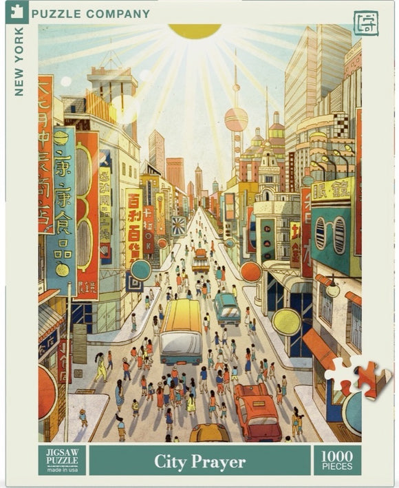 A colorful, bustling city scene featured on the jigsaw puzzle titled 'City Prayer' by New York Puzzle Company. The illustration shows a vibrant urban street filled with people, vehicles, and shop signs in various languages. The sun shines brightly overhead, illuminating the busy atmosphere and details of the city life. This jigsaw puzzle consists of 1000 pieces, offering a challenging and enjoyable experience for puzzle enthusiasts.