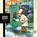 A 1000-piece jigsaw puzzle titled 'Just a Pinch' by New York Puzzle Company, featuring a whimsical illustration of a chef outside a cafe, snowflakes falling around him. The design showcases a charming winter scene with warm, inviting colors and detailed artistry.