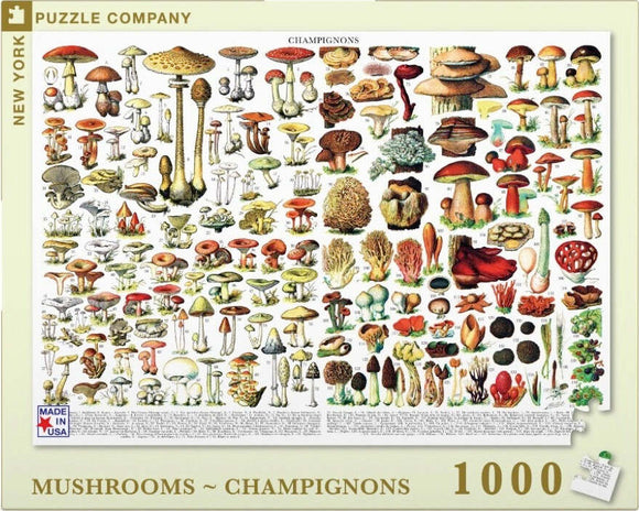 A 1000-piece jigsaw puzzle featuring various illustrations of mushrooms, showcasing diverse shapes, colors, and sizes. The design includes detailed depictions of fungi, arranged in an organized layout with names and numbers. The puzzle is created by the New York Puzzle Company and emphasizes educational and natural themes.