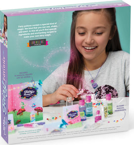 A young girl joyfully engages with the Craft Tastic 'Make Your Own Fairy Potions' DIY kit. The vibrant packaging showcases colorful potion bottles and ingredients, inviting creativity. The girl is surrounded by components of the kit, including tiny decorative items, as she prepares to mix her own magical concoctions, embodying the enchanting theme of fairy magic.