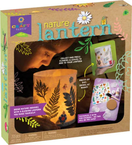 The Nature Lantern DIY kit by Craft Tastic, showcasing a vibrant, illuminated lantern decorated with pressed flowers and leaves. The packaging highlights features like collecting nature, customizing with stickers, and its dual display as a decorative piece by day and a glowing lantern by night. Recommended for ages 8 and up.