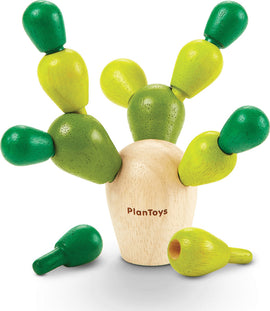 A Balancing Cactus Mini game by Plan Toys featuring a wooden cactus with colorful green and yellow pegs. The game encourages coordination and balance as players stack the pegs on the base. Perfect for developing fine motor skills and provides interactive fun for kids.