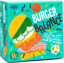 Burger Balance game box by Professor Puzzle features vibrant artwork of a stacked burger with various toppings. The box highlights the game's objective: roll the die and stack the components high in this engaging balancing game suitable for ages 6 and above, designed for 2 or more players.