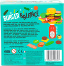 Burger Balance game by Professor Puzzle, featuring colorful wooden pieces representing various burger ingredients like cheese, tomato, bacon, and pickles. Players stack these pieces atop a wooden ketchup bottle, aiming to build the tallest burger without toppling it. The game includes a die that players roll to determine which ingredient to add, enhancing skill and balance as the tower grows.