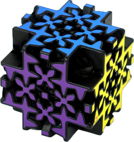 Maltese Gear mechanical puzzle by Project Genius, featuring a complex design with colorful elements in blue, purple, and yellow set against a sleek black background. The puzzle challenges spatial reasoning and problem-solving skills, making it perfect for puzzle enthusiasts.