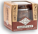 Pharaoh's Ale mechanical puzzle by Project Genius, featuring a detailed wooden barrel design. The packaged puzzle includes creative hieroglyphics and indicates a difficulty level of four stars. Ideal for fans of brainteasers and collectors of unique puzzles, suitable for ages 14 and up.