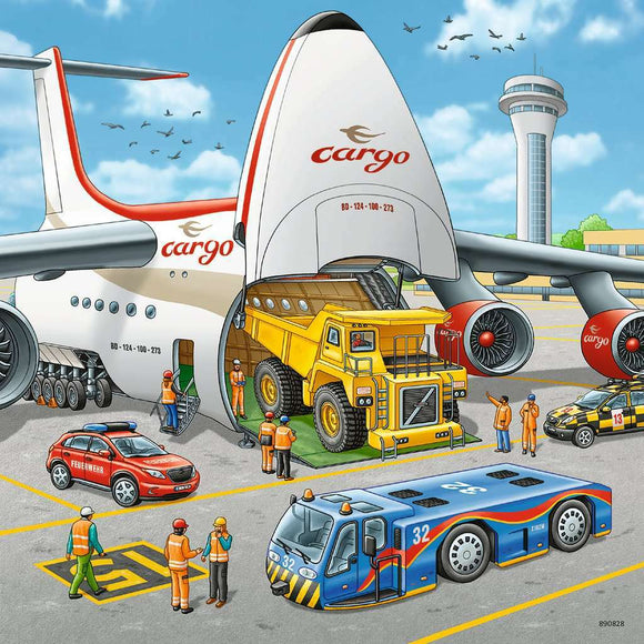 A vibrant illustration of a jigsaw puzzle featuring an airport scene with a cargo plane unloading a large yellow truck. Ground personnel in orange vests are coordinating the unloading process, while an airport control tower and various vehicles can be seen in the background. The scene is bustling with activity, capturing the essence of airport logistics.