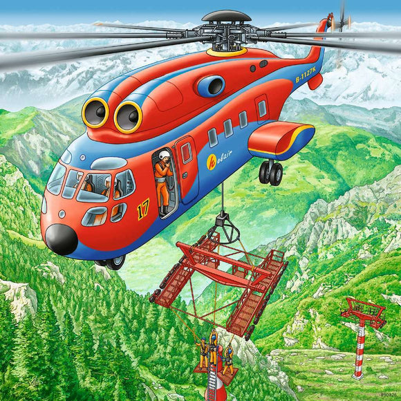 A colorful jigsaw puzzle titled 'Above the Clouds' featuring a red and blue helicopter hovering over a lush green mountainous landscape. The helicopter is lifting equipment and has a pilot visible in the cabin. This scene conveys adventure and scenic beauty.