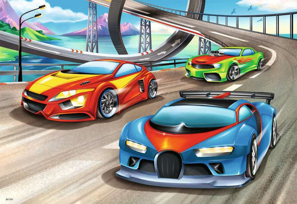 A vibrant jigsaw puzzle featuring colorful race cars speeding along a twisting road with scenic mountains and a lake in the background. Three dynamic cars are depicted: a red and yellow car, a blue car with a sporty design, and a green car with flame decals, all illustrating an exciting race atmosphere.