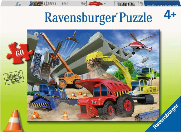A vibrant jigsaw puzzle featuring construction trucks and machinery, including a red dump truck, a yellow excavator, and a helicopter, set against a dynamic construction scene. The puzzle is made by Ravensburger and is suitable for ages 4 and up. It contains 60 pieces and showcases high-quality illustrations of vehicles at work.
