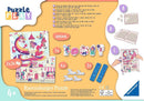 Ravensburger Puzzle & Play: Donut Dragon 2x featuring two colorful jigsaw puzzles. One side shows a vibrant dragon and castle scene, while the other features charming characters. The kit includes puzzle pieces and fun accessories for an engaging playtime experience, suitable for children aged 4 and up.