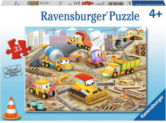 Colorful Ravensburger jigsaw puzzle titled 'Raise the Roof!'. The image features cheerful construction vehicles including a dump truck, excavator, cement mixer, and road roller, set in a busy construction site with barriers and buildings in the background. Suitable for children aged 4 and up, this puzzle has 35 pieces for engaging playtime.