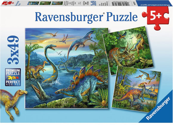 Ravensburger Dinosaur Fascination jigsaw puzzle set featuring three 49-piece puzzles. Each puzzle showcases vibrant illustrations of various dinosaurs in lush, prehistoric landscapes, ideal for children aged 5 and above. The packaging emphasizes premium quality and age appropriateness.