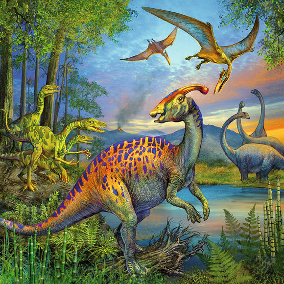 A vibrant jigsaw puzzle featuring a prehistoric scene with various dinosaurs, including a colorful hadrosaur in the foreground, surrounded by other dinosaurs, lush greenery, and a scenic backdrop of mountains and a sunset.