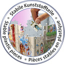 A close-up view of a hand placing a jigsaw puzzle piece into a Disney Castle themed jigsaw puzzle by Ravensburger. The puzzle shows vibrant images of Disney characters, with plastic pieces designed for stability.