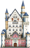 A beautifully detailed jigsaw puzzle of Neuschwanstein Castle, featuring intricate architectural elements such as pointed towers and a grand entrance, showcasing a blend of historical design and vibrant colors. Suitable for puzzle enthusiasts and castle lovers, this Ravensburger puzzle offers an engaging challenge.