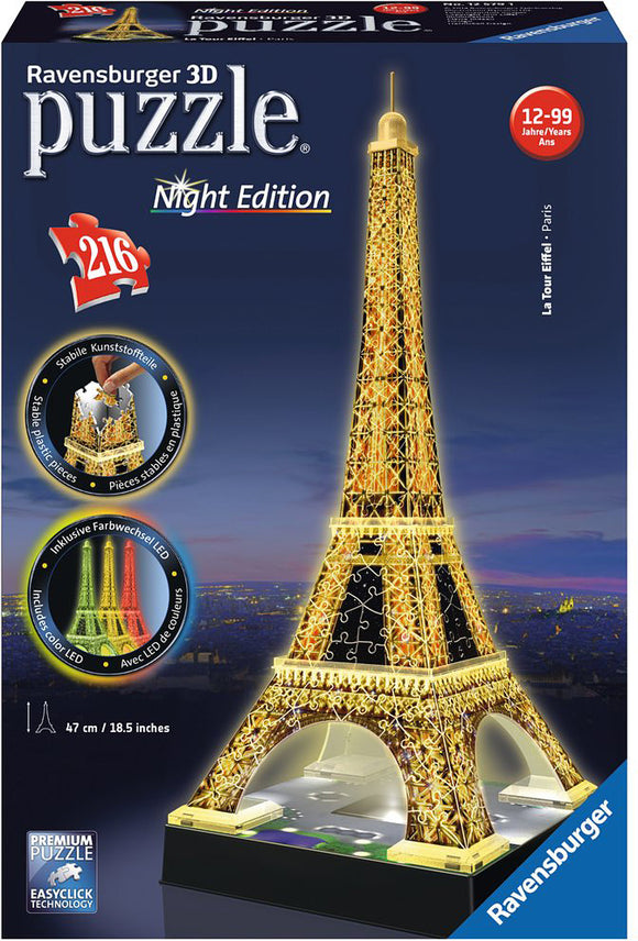 Eiffel Tower - Night Edition 3D Puzzle by Ravensburger. The box shows the completed puzzle display with the illuminated Eiffel Tower in vibrant colors. It features 216 pieces and is designed for ages 12 to 99. The puzzle showcases a beautiful night scene with LED lights, capturing the iconic Paris landmark.