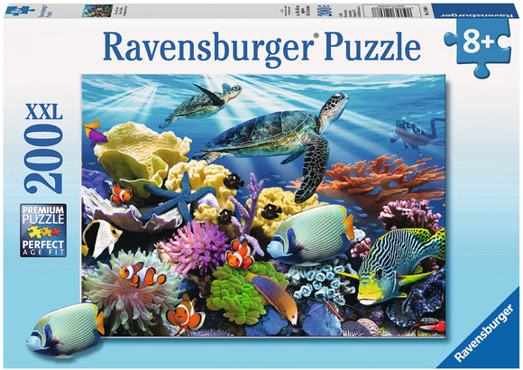 Ravensburger jigsaw puzzle featuring a vibrant underwater scene with ocean turtles gliding through colorful coral reefs inhabited by various tropical fish. The box indicates this puzzle contains 200 XXL pieces and is suitable for ages 8 and up, highlighting the premium quality of the puzzle for an engaging experience.