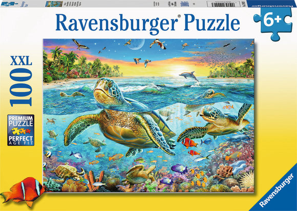 A Ravensburger jigsaw puzzle titled 'Swim with Sea Turtles,' featuring vibrant underwater artwork showcasing sea turtles, colorful fish, and a tropical ocean scene. This 100-piece XXL puzzle is designed for ages 6 and up, emphasizing detailed imagery and fun marine life.