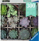 Ravensburger puzzle featuring a vibrant arrangement of 300 succulent plants displayed in small pots. A variety of colors and shapes are evident, enhancing the visual appeal. The box is labeled with '300 Ravensburger Puzzle' and emphasizes relaxation and enjoyment.
