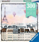 Ravensburger 300-piece jigsaw puzzle featuring a beautifully illustrated cityscape with charming rooftops and whimsical hot air balloons floating above. The scene includes the iconic Eiffel Tower, set against a soft, pastel sky, creating a calming and nostalgic atmosphere for puzzle enthusiasts.