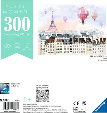 Ravensburger Jigsaw Puzzle titled 'Balloons'. Features a whimsical illustration of Paris, showcasing the Eiffel Tower and colorful hot air balloons floating in a pastel sky. The puzzle contains 300 pieces and measures 27 x 39 cm, designed for ages 8 and up. Premium quality with Softclick technology for a perfect fit, ideal for relaxation and enjoyable pastime.