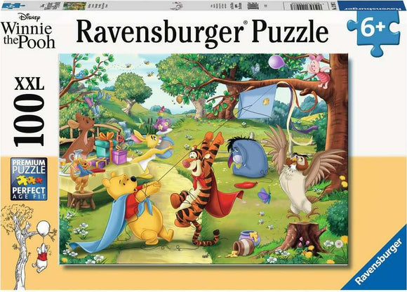 A colorful jigsaw puzzle titled 'Pooh to the Rescue' featuring Winnie the Pooh, Tigger, Piglet, Eeyore, and Owl in a whimsical outdoor setting. The puzzle displays vibrant characters engaging in a playful adventure, surrounded by nature, with trees, flowers, and various items like kites and picnic decorations. Ideal for ages 6 and up.