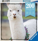 Ravensburger 200-piece jigsaw puzzle titled 'Puzzle Moments: Alpaca'. The image showcases a close-up of a fluffy white alpaca wearing a floral necklace, set against a soft blurred background that enhances the tranquility of the scene.