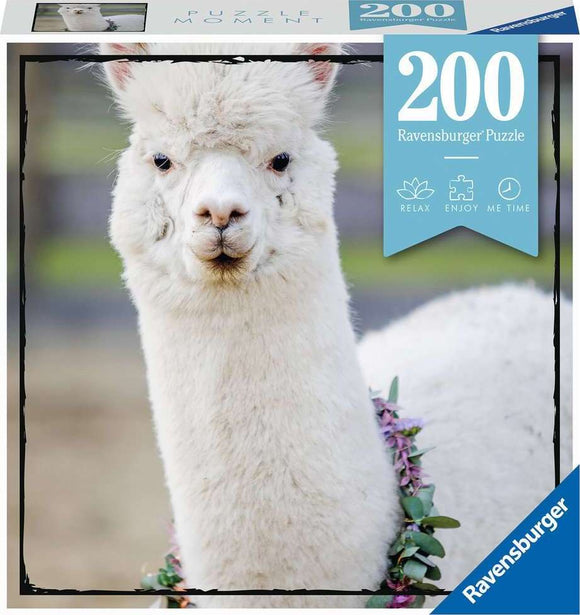 Ravensburger 200-piece jigsaw puzzle titled 'Puzzle Moments: Alpaca'. The image showcases a close-up of a fluffy white alpaca wearing a floral necklace, set against a soft blurred background that enhances the tranquility of the scene.