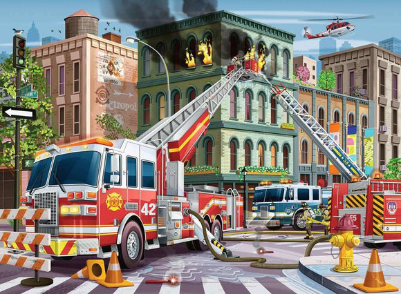 A vibrant jigsaw puzzle depicting a busy fire truck rescue scene. Fire trucks are positioned in front of a burning building, with firefighters using ladders to rescue individuals trapped inside. A helicopter hovers above, and traffic cones and barricades are set up nearby. The puzzle captures the excitement and urgency of a city rescue operation with detailed illustrations.