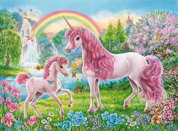 A colorful jigsaw puzzle featuring two magical unicorns in a whimsical landscape. The scene includes a rainbow, a waterfall, and vibrant flowers, with butterflies and a small bunny nearby. The larger unicorn has flowing pink hair and a golden horn, while the smaller unicorn playfully trots, adorned with tiny blossoms in its mane. A serene, enchanted forest backdrop completes this captivating image.