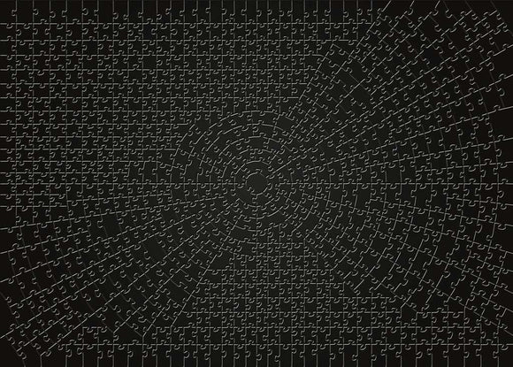 A completed jigsaw puzzle titled 'Krypt Black' by Ravensburger. The puzzle features a visually striking black background with intricate, interlocking pieces arranged in a circular spiral pattern, showcasing the unique design of the jigsaw.