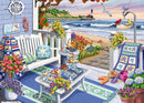 A colorful illustration of a seaside patio featuring a white swing with cushions, a table laid out with various treats, and a scenic background of waves and a lighthouse. The foreground is adorned with blooming flowers in vibrant pots, creating a cheerful and relaxing beach ambiance.