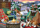 A cozy winter scene featuring a jigsaw puzzle design of a lodge setting. The image depicts green adirondack chairs adorned with colorful blankets, a campfire surrounded by roasting marshmallows, a Saint Bernard dog and its puppy lounging on a red rug, and a cat resting on a pillow. In the background, snow-covered mountains and a snowman can be seen, adding to the festive atmosphere of the scene.