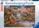 A captivating jigsaw puzzle titled 'Animal Kingdom' by Ravensburger featuring a vibrant scene of diverse wildlife. The artwork includes leopards, elephants, giraffes, and various birds, set against a picturesque backdrop of mountains, waterfalls, and lush greenery. This 3000-piece puzzle promises hours of engaging fun.