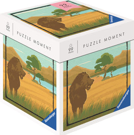 Ravensburger Safari jigsaw puzzle box featuring a beautifully illustrated landscape with a bear, a lush tree, and rolling hills under a blue sky. The box indicates it contains 99 pieces and showcases the vibrant colors of the artwork.