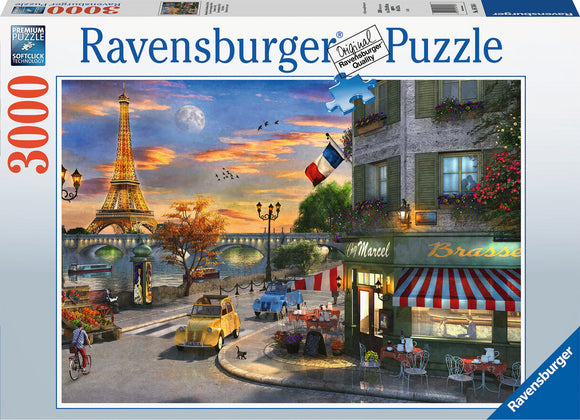 Ravensburger jigsaw puzzle titled 'Paris Sunset' featuring a picturesque Parisian scene with the Eiffel Tower at sunset, vibrant colors, classic vehicles, and a charming café. The puzzle contains 3000 pieces and showcases beautiful details of the city and its atmosphere.