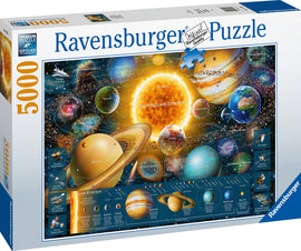 Ravensburger's Space Odyssey jigsaw puzzle featuring a vibrant depiction of our solar system, including planets, moons, and spacecraft. The puzzle showcases celestial bodies like Saturn, Jupiter, and the Sun, with labeled images illustrating various astronomical features. Ideal for astronomy enthusiasts and puzzle lovers, this 5000-piece puzzle offers a challenging and educational experience.