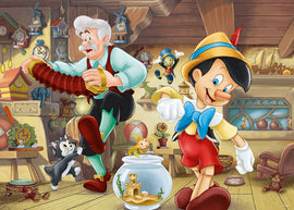 A vibrant jigsaw puzzle featuring Pinocchio and Geppetto in a charming workshop. Pinocchio smiles, wearing a blue bow tie and red shorts, as Geppetto plays an accordion. Various toys and wooden figures adorn the background, creating a nostalgic atmosphere. A cat and a goldfish complete the scene.