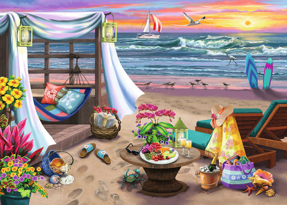 A vibrant jigsaw puzzle image depicting a serene beach scene at sunset. It features a cozy hammock, colorful flowers, relaxing beach chairs, and a table with delicious fruit and drinks. The ocean waves crash in the background under a clear sky with a sailing boat and seagulls, creating a peaceful retreat atmosphere.