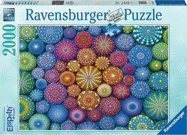 The Radiating Rainbow Mandalas jigsaw puzzle by Ravensburger features a vibrant collection of intricately designed mandalas in various colors and patterns. The 2000-piece puzzle showcases a kaleidoscope of circles that radiate color and energy, perfect for puzzle enthusiasts looking for a challenging yet visually stunning experience.