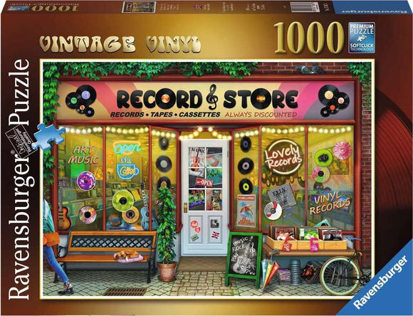 A colorful jigsaw puzzle featuring a vintage record store with a bright storefront displaying records and cassette tapes. The scene includes a welcoming atmosphere with a bench outside, signs announcing sales, and vibrant decorations like vinyl records adorning the windows. The puzzle consists of 1000 pieces and showcases intricate details characteristic of Ravensburger's premium quality.