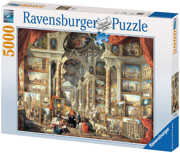 A jigsaw puzzle box featuring 'Views of Modern Rome' by Ravensburger. The design showcases a detailed artwork filled with classical architecture and scenes of Rome, including columns, statues, and people engaged with the art. The box includes a vibrant illustration of the completed puzzle, emphasizing its intricate design and rich details, suitable for puzzle enthusiasts and lovers of art.