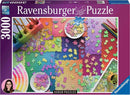 Ravensburger 3000-piece jigsaw puzzle titled 'Karen Puzzles on Puzzles'. The image features a colorful array of interlocking puzzle pieces spread out on a vibrant, patterned surface, alongside art supplies like colored pencils and paint swatches, showcasing a creative atmosphere ideal for puzzle enthusiasts.