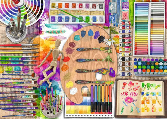 Colorful jigsaw puzzle depicting an artist's palette filled with various paints, brushes, and art supplies. The composition includes a wooden palette with vibrant colors, paint tubes, brushes, a figure, and an open sketchbook showcasing floral designs, all set against a dynamic splash of colors.