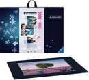 Ravensburger Puzzle Store Accessory jigsaw puzzle kit with visuals showing a detailed setup for assembling jigsaw puzzles. The packaging features vivid images of puzzle pieces and a completed jigsaw scene of a tree amidst lavender fields. The kit is designed for puzzles with 300 to 1000 pieces and includes innovative storage and assembly solutions.