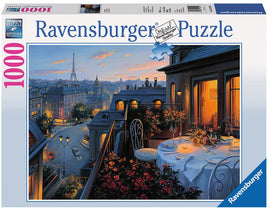 Ravensburger jigsaw puzzle titled 'Paris Balcony', featuring a picturesque evening scene with a view of the Eiffel Tower, a beautifully set table with candles and flowers on a balcony overlooking Parisian streets bathed in golden light.