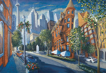 A beautifully illustrated jigsaw puzzle titled 'The Flat Iron' by Ravensburger, depicting a vibrant urban scene with the iconic Flat Iron building, surrounded by greenery, modern skyscrapers, and classic cars. The artwork showcases rich colors and details, perfect for puzzle enthusiasts who enjoy cityscapes.
