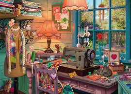 A vibrant jigsaw puzzle titled 'The Sewing Shed' by Ravensburger, featuring a cozy sewing room filled with colorful fabrics, a sewing machine, and charming decor. The scene includes a mannequin dressed in a colorful scarf, a wooden desk cluttered with sewing essentials, and a sunny window view of a garden.