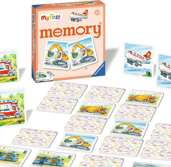 The product features a memory card game titled 'my first memory®: Vehicles' by Ravensburger. The game includes colorful illustrated cards showcasing various vehicles like an ambulance, an airplane, and construction machinery. The game box is prominently displayed and the cards are laid out in rows, inviting young players to match pairs and enhance their memory skills. It's designed for children aged 2 and up.